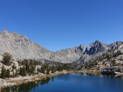 We make it to the ridge at around 11,200' and find the next lake in a small basin along the divide.
